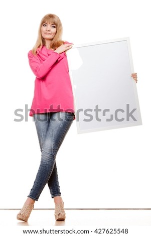 Advertisement concept. Fashion woman full body with blank presentation board. Female model showing banner sign billboard copy space for text. Isolated
