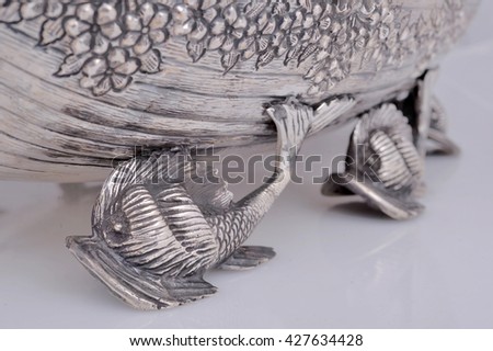 Close up photo of handmade silverware that is delicately handcrafted, silver handicrafts, Custom made authentic designs are the key factor in getting the fine art made. 