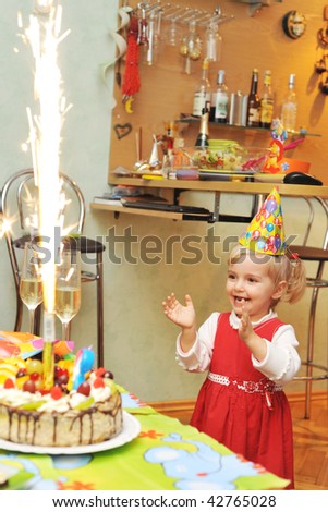Pleasure and happiness of  little girl on birthday