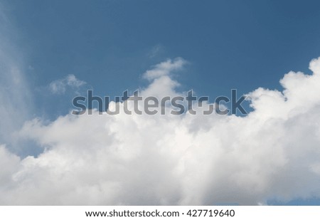 white cloud in blue sky in the rainy season
