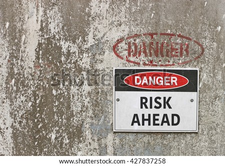 red, black and white Danger, Risk Ahead warning sign