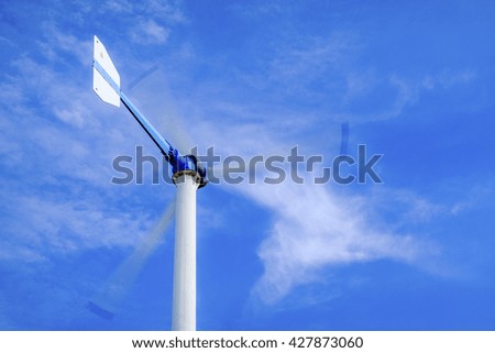 Wind turbines on blue sky background