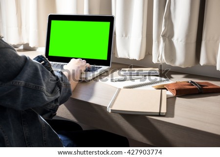 People working in bedroom at night with green screen computer pencil and notebook, Lighting from lamp