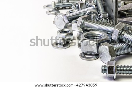 Each threaded fasteners bolts nuts. Royalty-Free Stock Photo #427943059