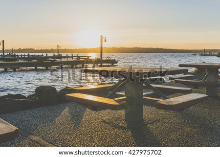 picnic table in dock area when sunset.
