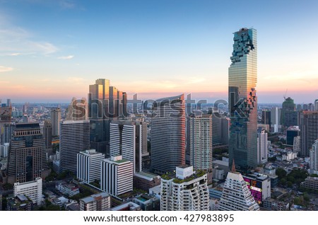 View of modern office buildings, condominium in big city downtown with sunset sky Royalty-Free Stock Photo #427983895