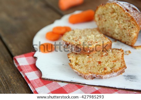 Carrot muffin on a white board