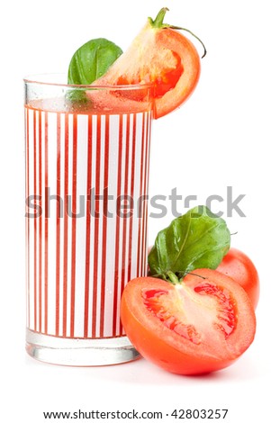 Fresh tomato juice with basil isolated on white background