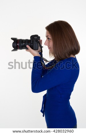 Profile of a Female Photographer shooting someone