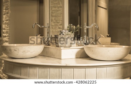 Close-up of washbasins in public toilet room,vintage effect style pictures