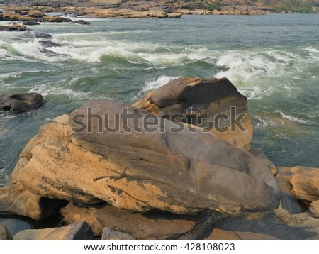 River flow through the rocks at Kaeng Tana, Ubon Ratchathani, Thailand