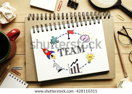 Chart of "Digital Marketing" sketched on notebook with office supplies background (Business Concept)