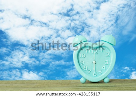Good morning concept , Alarm clock and blue sky