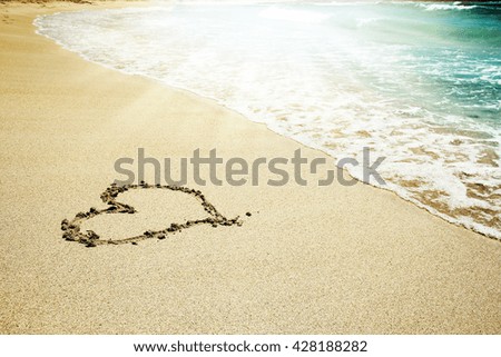 the inscription on the sand of the sea