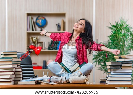 Young female student preparing for college school exams