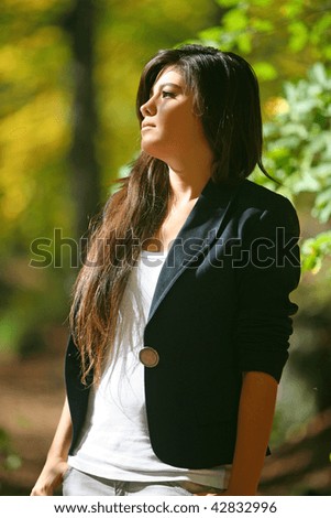 Picture of beautiful girl in the foliage