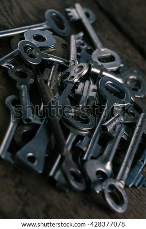 Set of keys on wood background photo