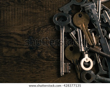 Set of keys on wood background photo