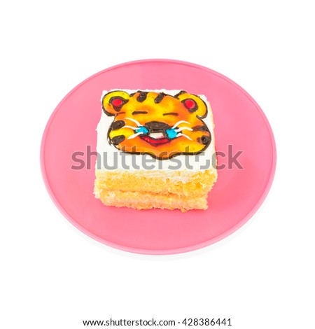 Yummy tiger cartoon decorated cake on white background with working path