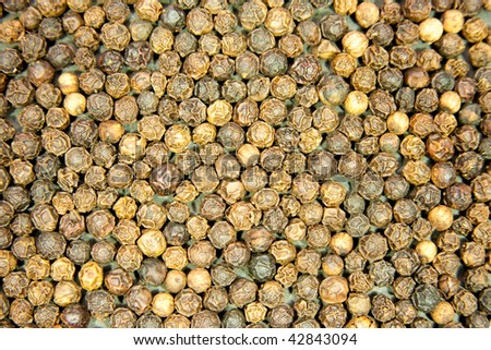 Backround of whole peppercorns