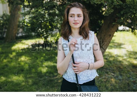 Beautiful young girl smiling in the park. healthy new life image