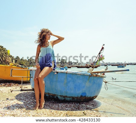 cute smiling young real woman in asian port, vietnam traveller