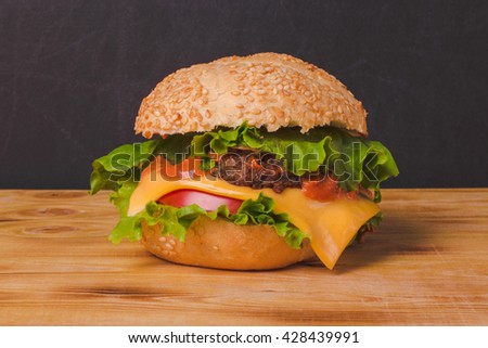 freshly cooked burger in the kitchen Royalty-Free Stock Photo #428439991