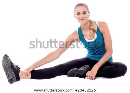 Beautiful woman doing stretching exercise
