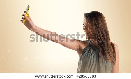 Young girl making a selfie