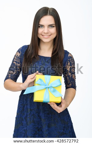 Young woman portrait holding gift