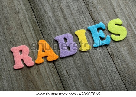 rabies word on wooden background. medical concept