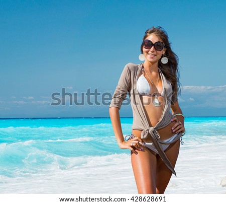 Beautiful young woman  on the beach in Kefkada Greece