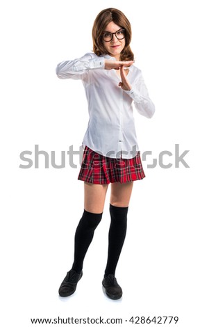 Student girl making time out gesture