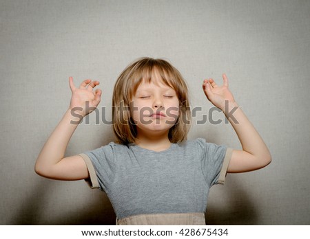 girl raises arms up
