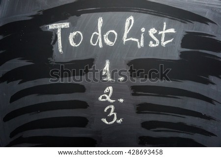 TO DO LIST  motivational quote written on a blackboard