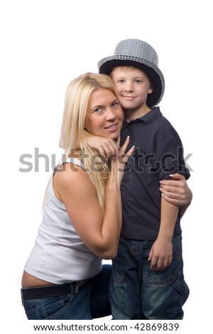 beautiful young mother with blond hair and her son in a black suit and hat