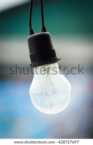 Old electric bulb closeup - Concept background