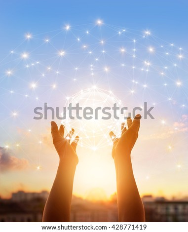 Abstract science, circle global network connection in hands on sunset background Royalty-Free Stock Photo #428771419