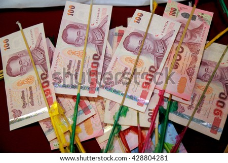 Donation Merit Money Tree in Thai Temple. Money tree at Buddhist temple in Thailand consisting of banknotes donated by visitors for maintenance of the temple. Close up and select focus, close up image