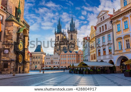 Spring morning on the Old Town square with Tyn Church. Sunny sityscape in capital of Czech Republic - Prague, Europe. Artistic style post processed photo.