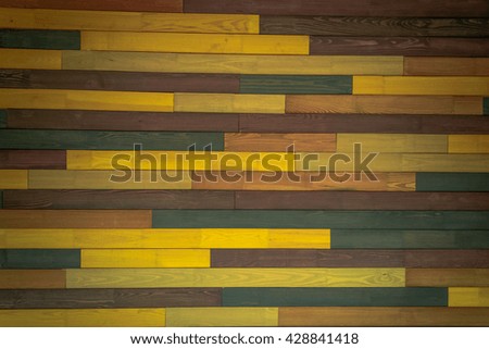 Colorful wooden wall made of different types of wood, pine, oak, maple, spruce. All boards of different colors Photography can be used for textures and backgrounds in a variety of image editors