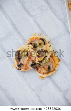 Small pizza pieces. Finger food.