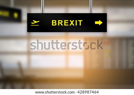 brexit or british exit on airport sign board with blurred background and copy space Royalty-Free Stock Photo #428987464