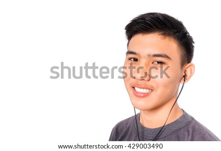 A smiling boy with music.