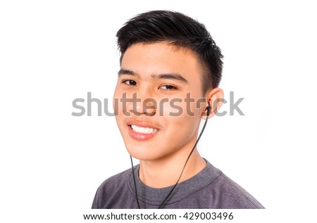 A smiling boy with music.