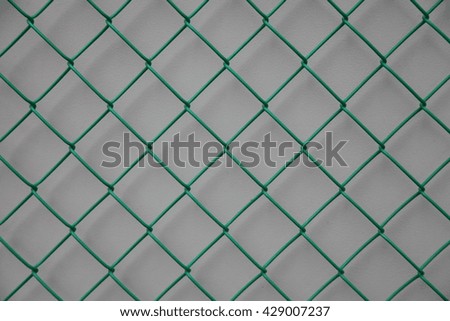 Steel green mesh on gray background