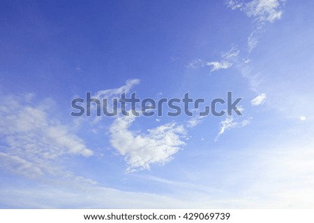 Blue sky with cloud,select focus with shallow depth of field:ideal use for background.