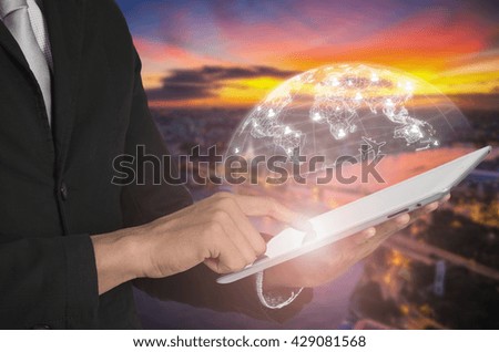 Businessman and tablet with hologram globe social network and connection concept.