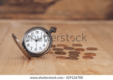 Business Money Concept Idea, Clock and Coins