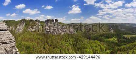 Rock formations at the Bastei in the Saxon Switzerland region in Germany. Photographed on a bright and sunny day.